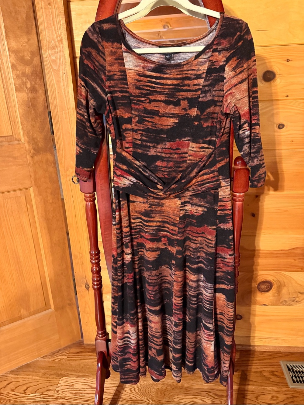 Perceptions Twist-Front Midi Dress in Rust and Black Abstract